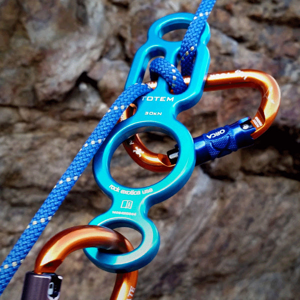 Rock Exotica Totem Descender– The Totem was designed to be the most versatile rigging and rappelling tool available. It can function as a rigging plate, an easy-to-lock-off figure 8. – Now available at MTN Shop US.