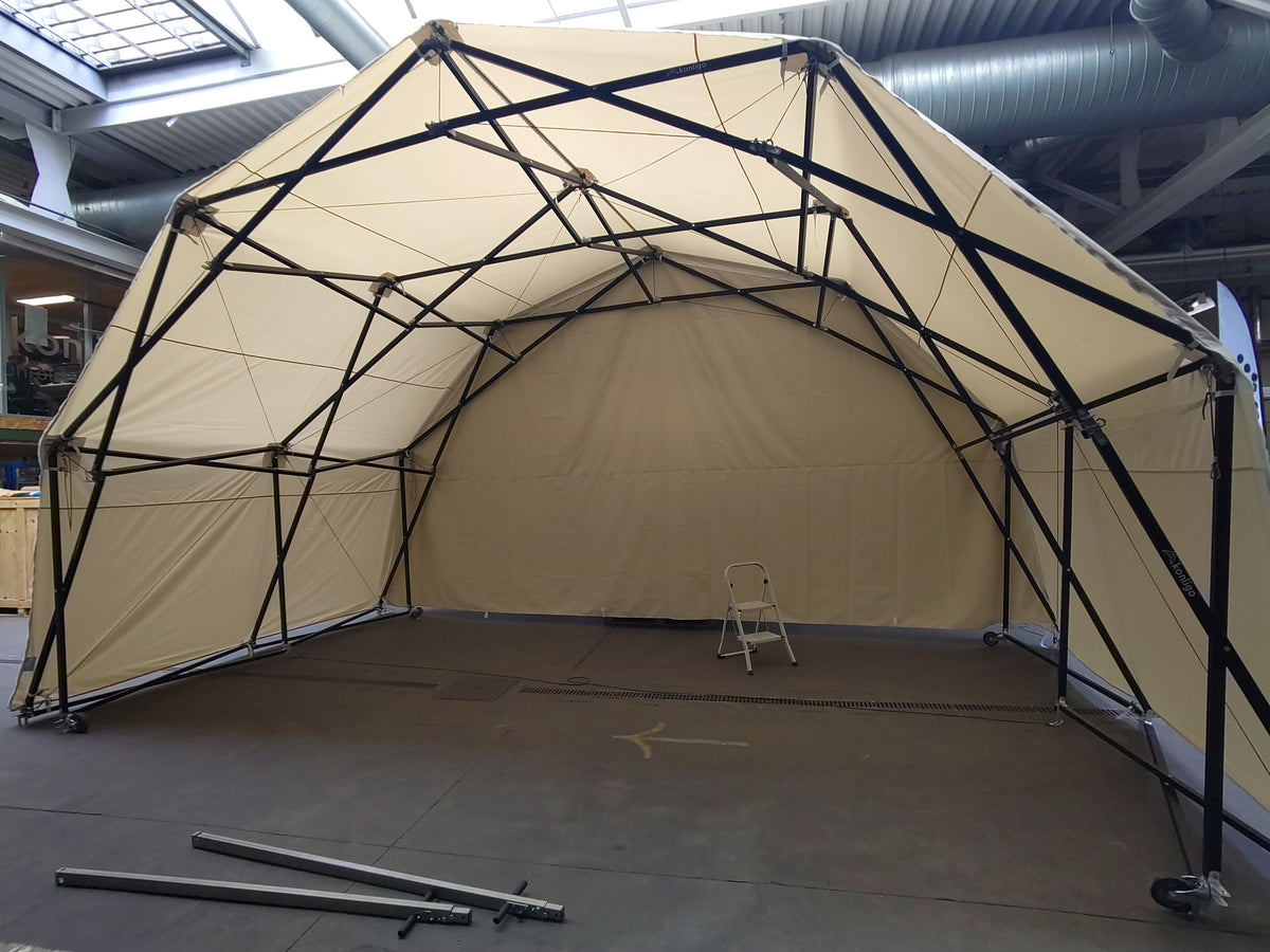 Konligo Fastival event structure with full white outside backdrop and membrane cover assembled indoors, now available on MTN SHOP US. - imagen 8