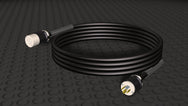 Motion Labs L21-30 Twistlock Cable coiled, with a female twistlock connector and a male plug